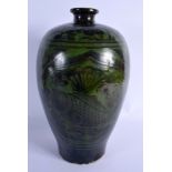 A 19TH CENTURY CHINESE GREEN AND BLACK GLAZED MEIPING VASE painted with fish and leaves. 34 cm high.