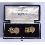 A PAIR OF ART DECO GOLD AND YELLOW STONE CUFFLINKS possibly Yellow Sapphires. 9 grams. 1.5 cm x 1.3