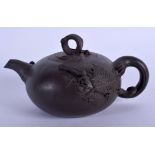A CHINESE YIXING POTTERY TEAPOT AND COVER 20th Century. 15 cm wide.