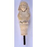 A 19TH CENTURY FRENCH EGYPTIAN REVIVAL CARVED BONE IVORY CANE HANDLE. 9 cm long.