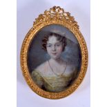 AN ANTIQUE PAINTED IVORY PORTRAIT MINIATURE painted with a female. Image 6.5 cm x 4.5 cm.