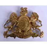 AN ANTIQUE MILITARY BRASS LION AND UNICORN BADGE. 13 cm x 10 cm.