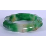 A CHINESE JADE BANGLE 20th Century. 8.5 cm wide.