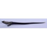 A 19TH CENTURY CONTINENTAL BRONZE CAPPED HORN LIZARD possibly a paper knife. 23.5 cm long.