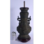 A 1960S CHINESE TWIN HANDLED ARCHAIC STYLE BRONZE VASE converted to a lamp. Bronze 40 cm x 20 cm.