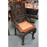 A 19TH CENTURY CHINESE CARVED HONGMU HARDWOOD MARBLE INSET CHAIR decorated with dragons. 102 cm x 40