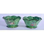 A PAIR OF LATE 19TH CENTURY CHINESE ENAMEL LOTUS FORM BOWLS Qing, painted with insects and fruits. 1