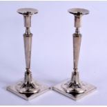 A PAIR OF ART NOUVEAU GERMAN SILVER CANDLESTICKS. 512 grams. 24 cm high.