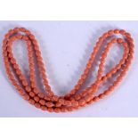 AN EARLY 20TH CENTURY CARVED CORAL NECKLACE. 37 grams. 110 cm long.