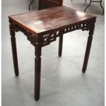 A STYLISH EARLY 20TH CENTURY CHINESE HARDWOOD HONGMU TABLE with foliate frieze and Greek key decorat