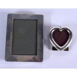 TWO STERLING SILVER PHOTOGRAPH FRAMES. 123 grams. Largest 10 cm x 7.5 cm. (2)