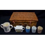 A collection of Royal family related porcelain together with a vintage picnic basket (Qty).