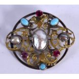A 19TH CENTURY AUSTRO HUNGARIAN BAROQUE PEARL AND RUBY BROOCH. 3.5 cm wide.