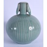 A KOREAN CELADON TWIN HANDLED BULBOUS VASE. 14 cm x 9 cm.