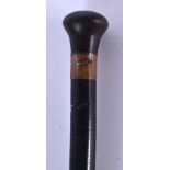 A RARE 19TH CENTURY MIDDLE EASTERN INDIAN CARVED FULL LENGTH RHINOCEROS HORN CANE of tapering form.
