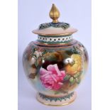 Royal Worcester vase and cover in Hadley style painted with pink and yellow roses under a pierced ne
