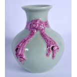 AN EARLY 20TH CENTURY CHINESE PORCELAIN CELADON VASE Late Qing, overlaid with pink ribbons. 11.5 cm