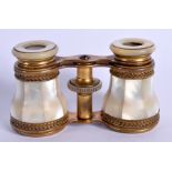 A PAIR OF ANTIQUE BRASS BINOCULARS. 9 cm x 7 cm.