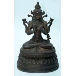 A large Chinese/Tibetan bronze buddha 35 x 25cm.