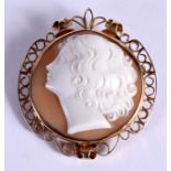 A 9CT GOLD CAMEO BROOCH carved with a pretty female. 17 grams. 5 cm x 4.5 cm.