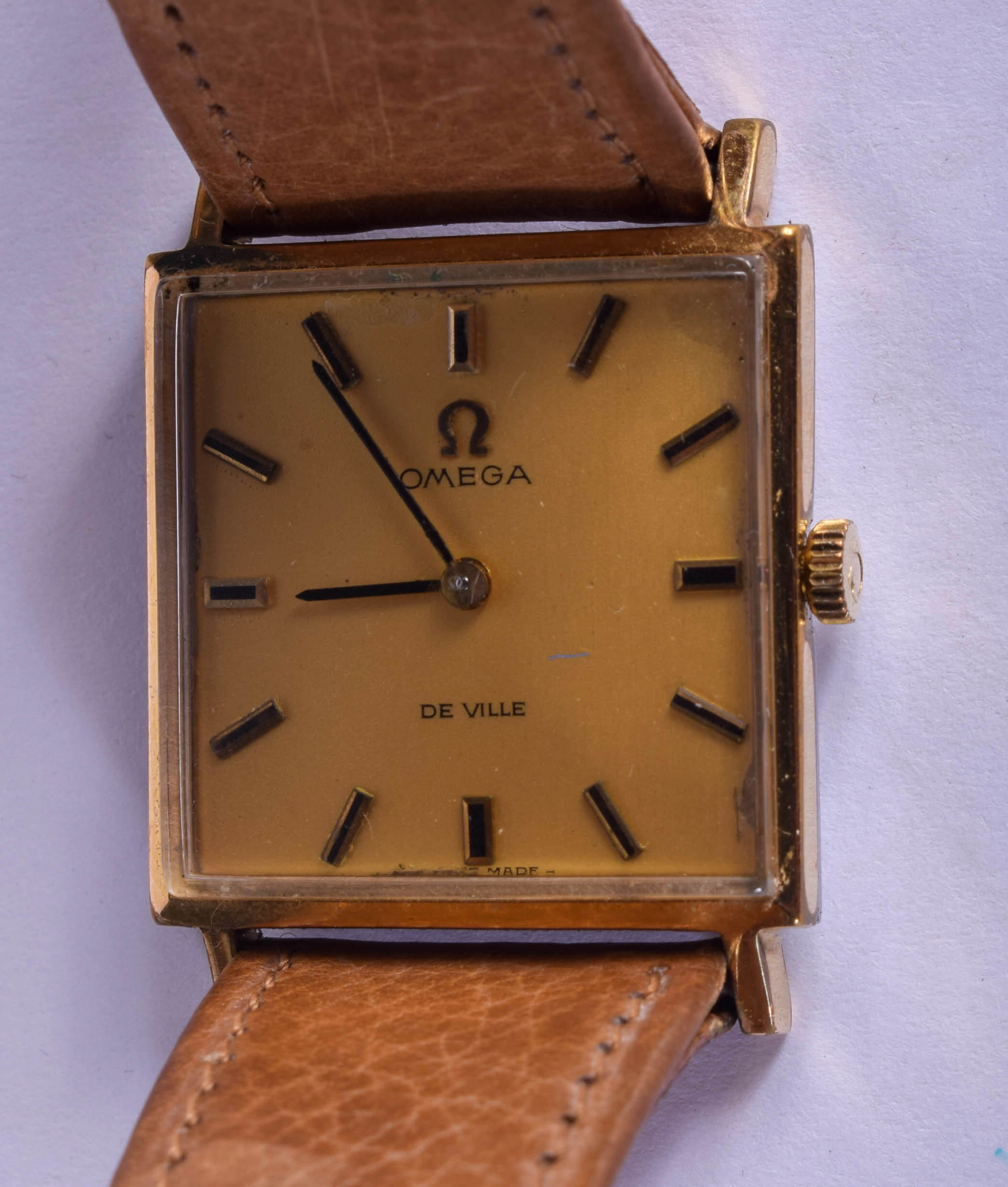 AN OMEGA DE VILLE YELLOW METAL AND STAINLESS STEEL WRISTWATCH. 2.75 cm wide.