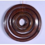 A RARE SET OF EARLY 20TH CENTURY CHINESE CARVED JADE CONCENTRIC RINGS Late Qing/Republic. 15 cm diam