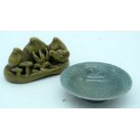 A small green glazed fruit pod brush rest together with a crackle glazed dish 15 x 18cm.