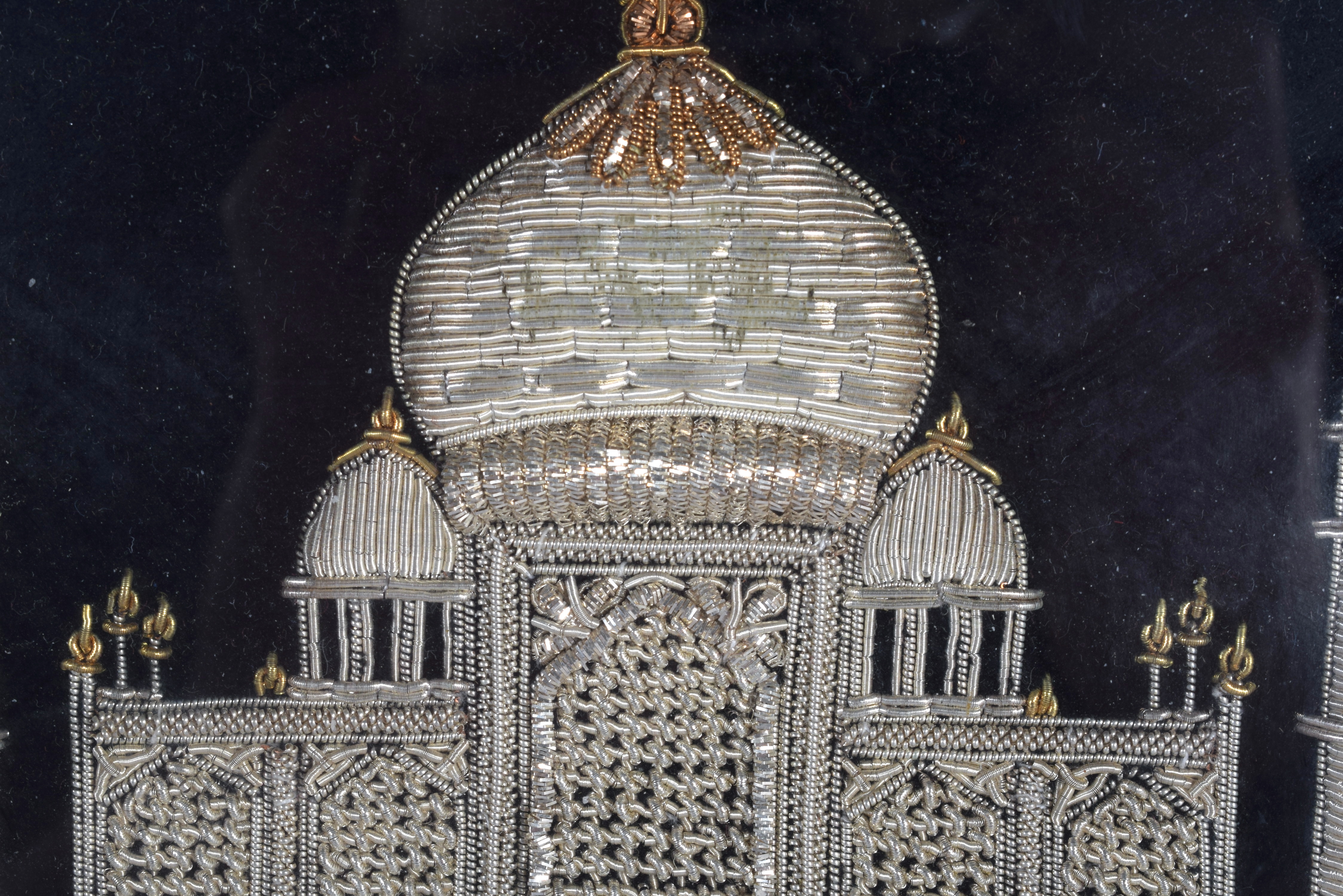 A VINTAGE INDIAN SILVER AND GOLD THREAD EMBROIDERY OF THE TAJ MAHAL. Image 36 cm x 28 cm. - Image 2 of 3