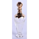 AN ANTIQUE 18CT GOLD FRENCH GLASS SCENT BOTTLE. 11 cm high.
