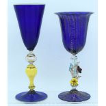 TWO VENETIAN BLUE GLASS GOBLET CUPS one with foliate stem. Largest 24 cm high. (2)