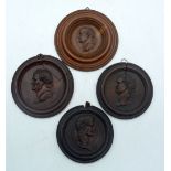 FOUR CHARMING 18TH CENTURY CONTINENTAL CARVED FRUITWOOD CAMEO ROUNDELS depicting Romanesque scholars