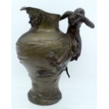 A LARGE 19TH CENTURY FRENCH CLASSICAL FORM BRONZE EWER modelled as a leaning male modelled at sea vi