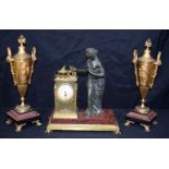 A LARGE 19TH CENTURY FRENCH BRONZE AND RED MARBLE CLOCK GARNITURE. 37Cm high (3).