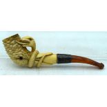 AN ANTIQUE MEERSCHAUM AND AMBER SNAKE & SNIPE PIPE. 10 cm wide.