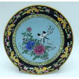 AN EARLY 20TH CENTURY CHINESE CANTON ENAMEL CIRCULAR DISH Late Qing, painted with magpie amongst fol