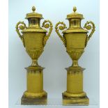 A LARGE PAIR OF 19TH CENTURY FRENCH ORMOLU TWIN HANDLED CASSOLETTES modelled in the empire taste wit