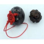 AN UNUSUAL 19TH CENTURY JAPANESE MEIJI PERIOD CARVED NUT NETSUKE TOGGLE together with an unusual oji