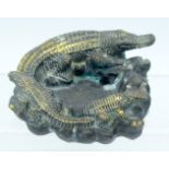 A 1950S CHINESE BRONZE BRUSH WASHER bearing Qianlong marks to base, overlaid with crocodiles. 14 cm