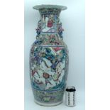 A LARGE 19TH CENTURY CHINESE CANTON FAMILLE ROSE PORCELAIN VASE Qing, painted with figures in variou