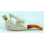 A RARE ANTIQUE MEERSCHAUM AND AMBER BOAT CANNON PIPE. 10.5 cm wide.
