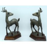 AN UNUSUAL PAIR OF EARLY 20TH CENTURY CHINESE PEWTER FIGURES OF DEER Late Qing/Republic, upon fitted