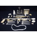 AN ANTIQUE SILVER PLATED CRUET SET together with antique ivory & bone carvings etc. (qty)