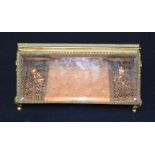 AN EARLY 20TH CENTURY FRENCH GILT METAL MOUNTED OPEN WORK JEWELLERY BOX decorated with figures upon