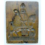 A LARGE 18TH CENTURY DUTCH CARVED FRUITWOOD BISCUIT MOULD PANEL depicting a figure riding upon a hor
