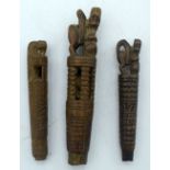 THREE 19TH CENTURY EUROPEAN CARVED TREEN SLIDING RATTLE FINIALS formed with lion terminals. Largest