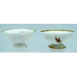 A PAIR OF EARLY 19TH CENTURY ENGLISH PORCELAIN SALTS painted with floral sprays. 6.5 cm wide.