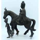 A CHINESE KOREAN QING DYNASTY CAST IRON FIGURE OF A HORSE modelled with an attendant upon its back,