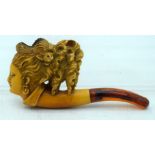 AN ANTIQUE MEERSCHAUM AND AMBER LADY PIPE. 8.25 cm wide.