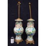 A LARGE PAIR OF MID 19TH CENTURY CHINESE CANTON CELADON FAMILLE ROSE VASES Qing, converted to lamps,