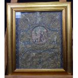 AN EARLY 18TH CENTURY EMBROIDERED ROLLED PAPER WATERCOLOUR LANDSCAPE depicting saints and putti with